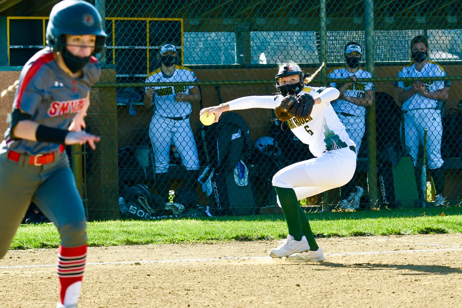 IRHS Softball - Savannah O'Shields throws towards first-SLy-2425.jpg